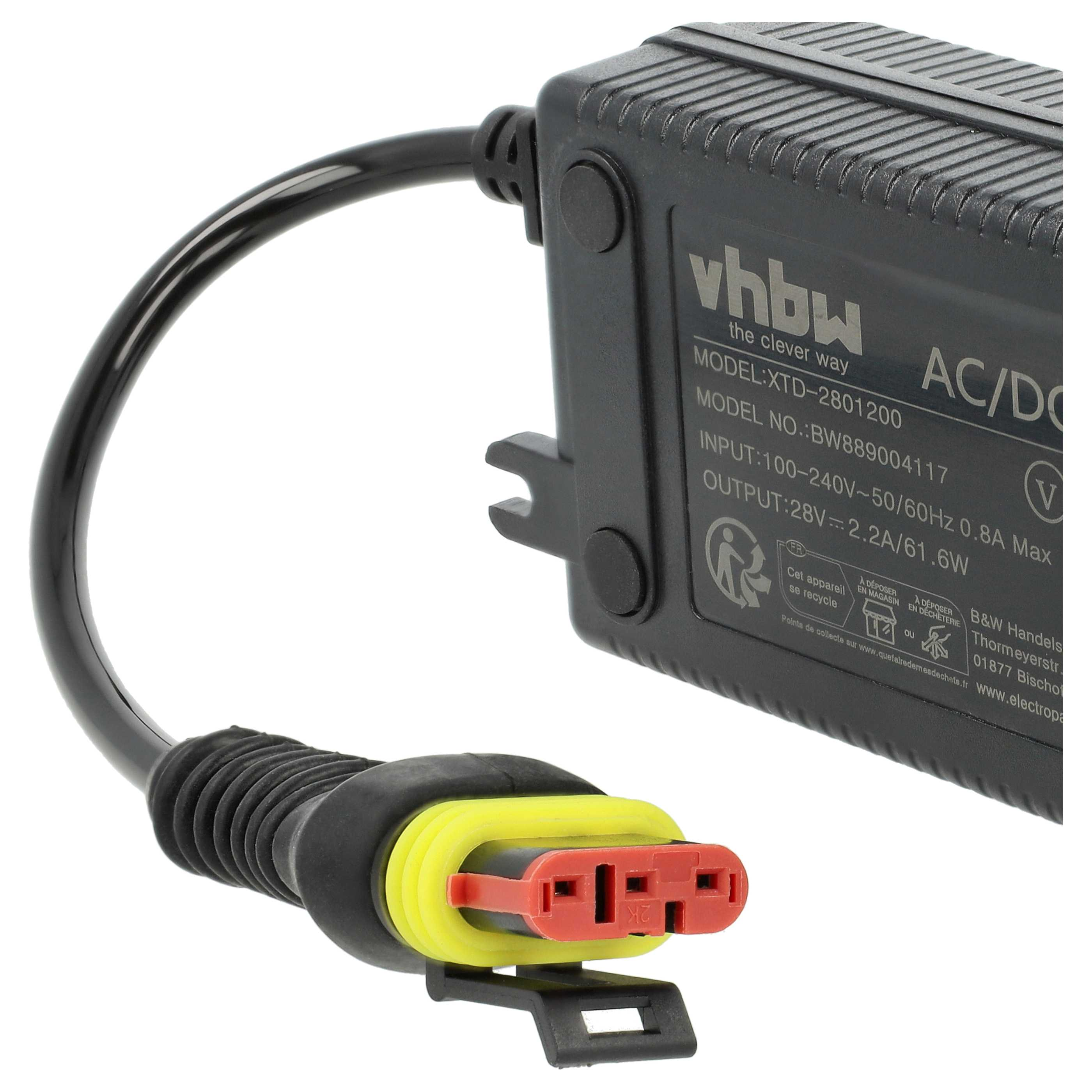 Ein schwarzes Netzteil mit schwarzem Kabel und gelb-rotem Stecker.