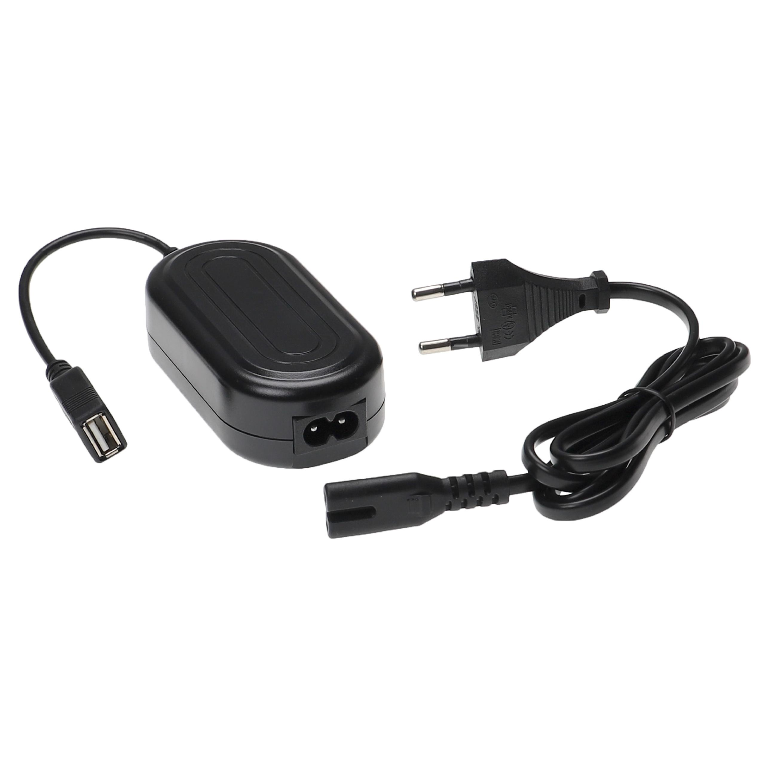 Ein schwarzes Netzteil mit USB-Anschluss und Netzstecker. Beide sind durch schwarze Kabel verbunden.