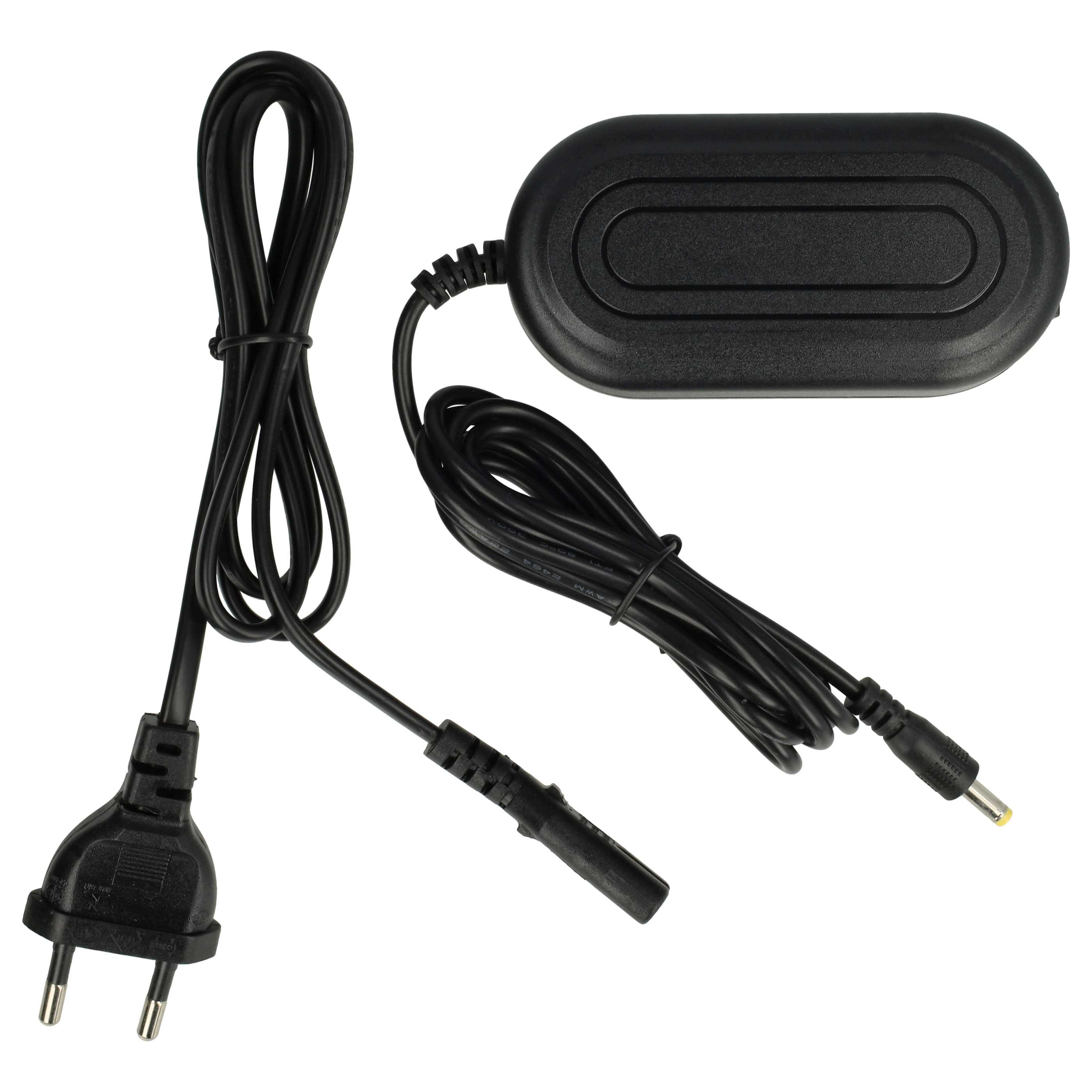 Ein schwarzes Netzteil mit Kabel, Stecker und Anschluss. Der Adapter ist rechteckig, Kabel sind gebunden.