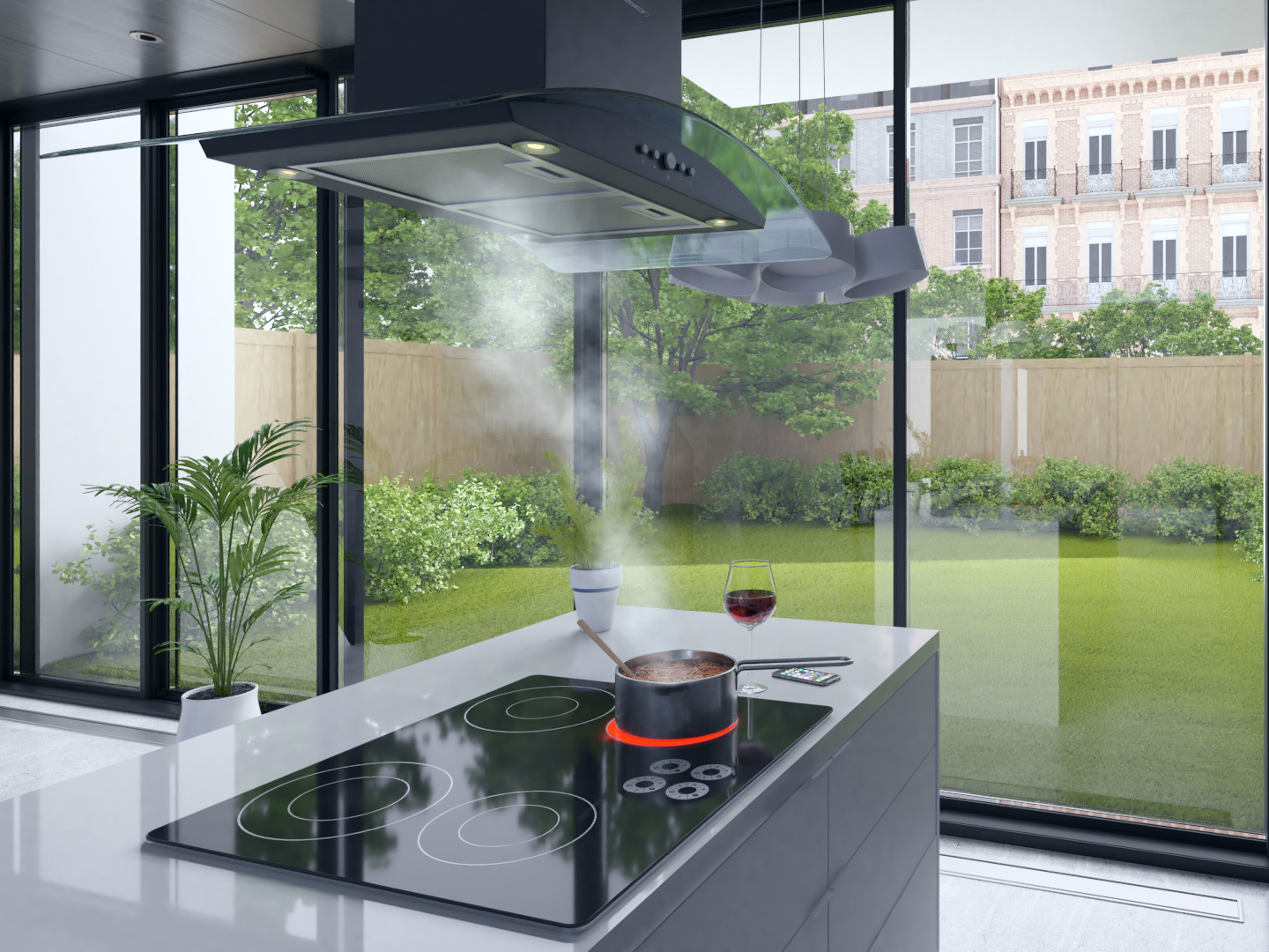 Wyspa kuchenna z garnkiem na kuchence, kieliszkiem wina i widokiem na ogród i budynki przez duże okno.