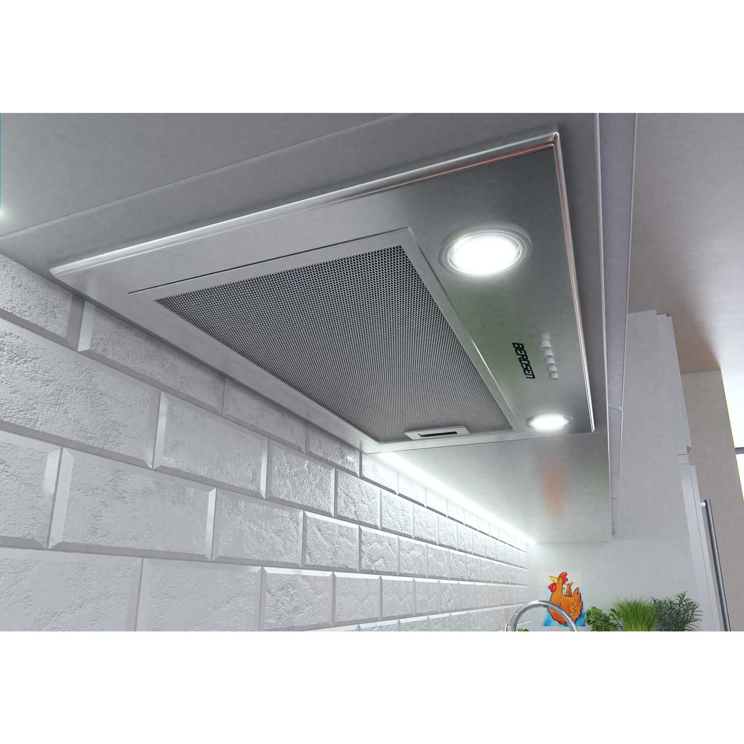 Okap ze stali nierdzewnej z oświetleniem zamontowany jest nad białą ceglaną ścianą. Poniżej widoczny jest rysunek kurczaka.