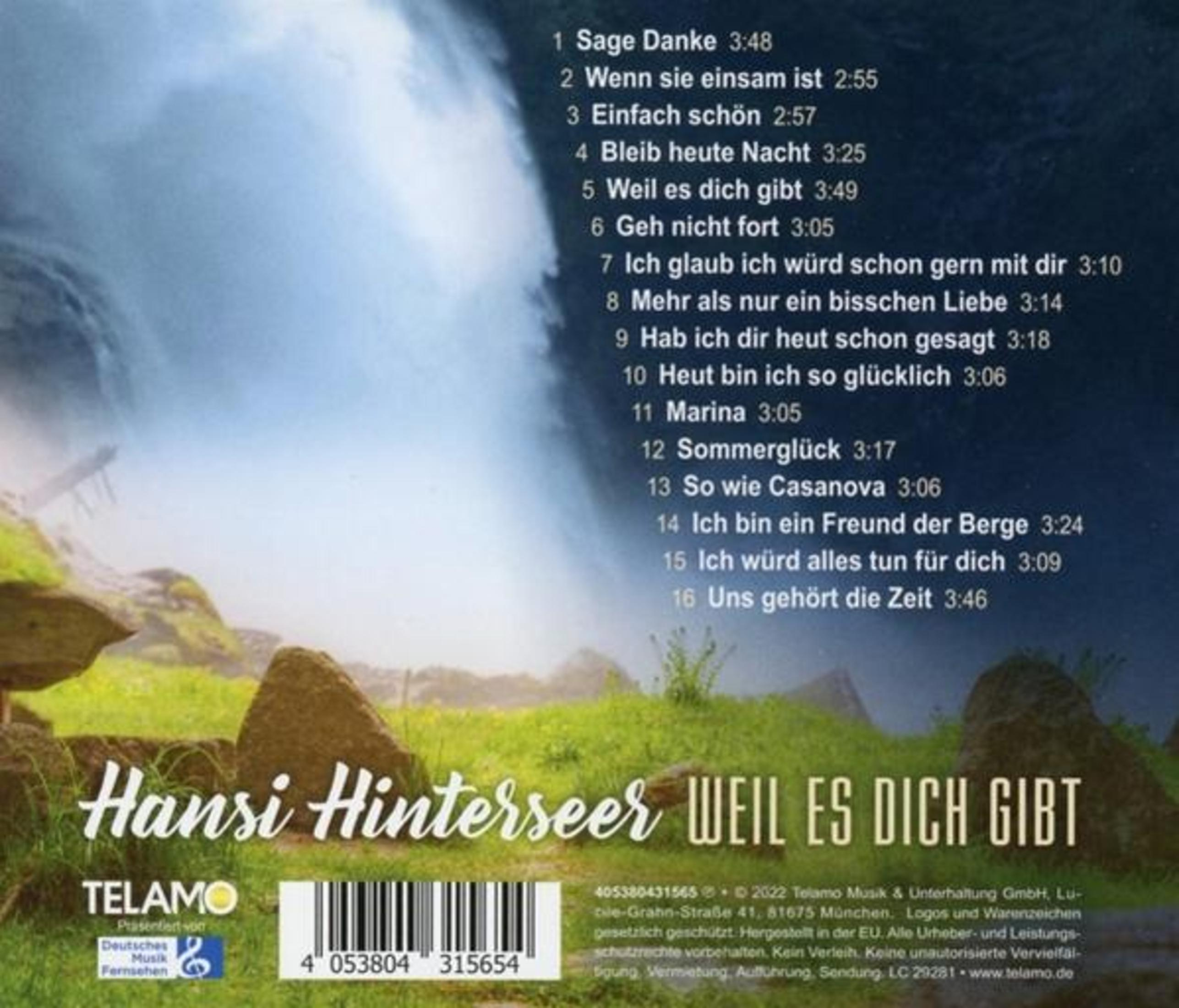 Albumcover mit Text: Hansi Hinterseer 'Weil es dich gibt'. Enthält Titelliste und Landschaftshintergrund.