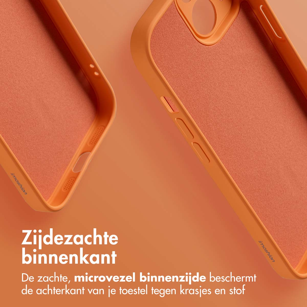Close-up of two orange phone cases. One is partially visible, showing the inside and the edge. The cases are made of soft material.