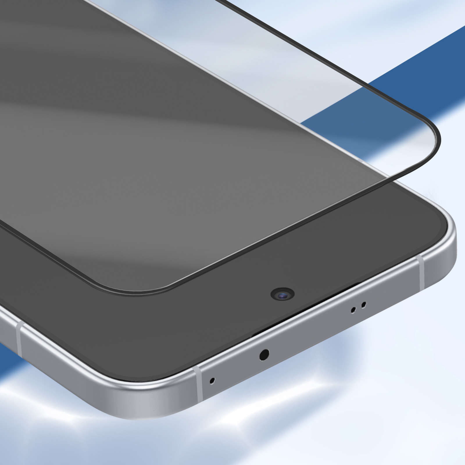 Primo piano di uno smartphone con protezione schermo. Il telefono è argento, lo schermo grigio.