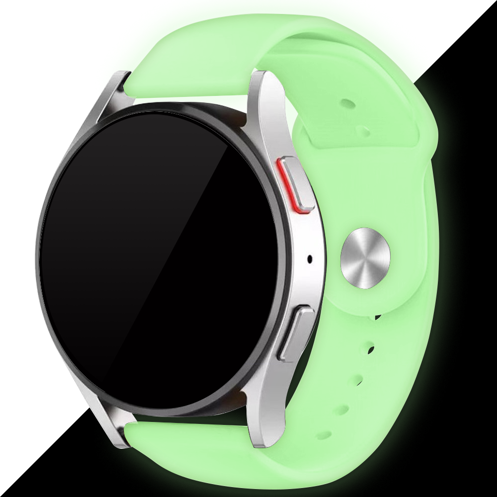 Eine silberne Smartwatch mit schwarzem Bildschirm und hellgrünem Armband. Die Uhr hat zwei Knöpfe und einen roten Akzent.