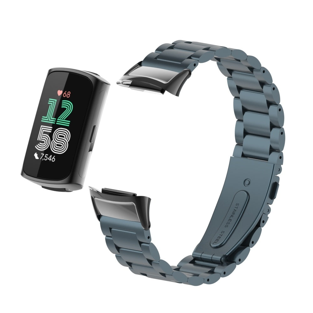 Eine schwarze Smartwatch mit blauem Stahlband. Die Uhr zeigt Zeit und Gesundheitsdaten an. Das Armband ist vom Uhrengehäuse getrennt.
