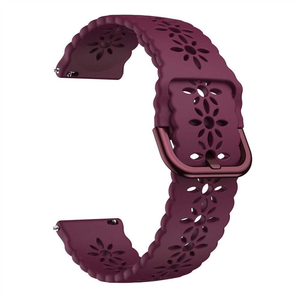 Ein weinrotes Uhrenarmband mit floralen Aussparungen und einer passenden Schnalle, auf weißem Hintergrund. Das Band ist gebogen.