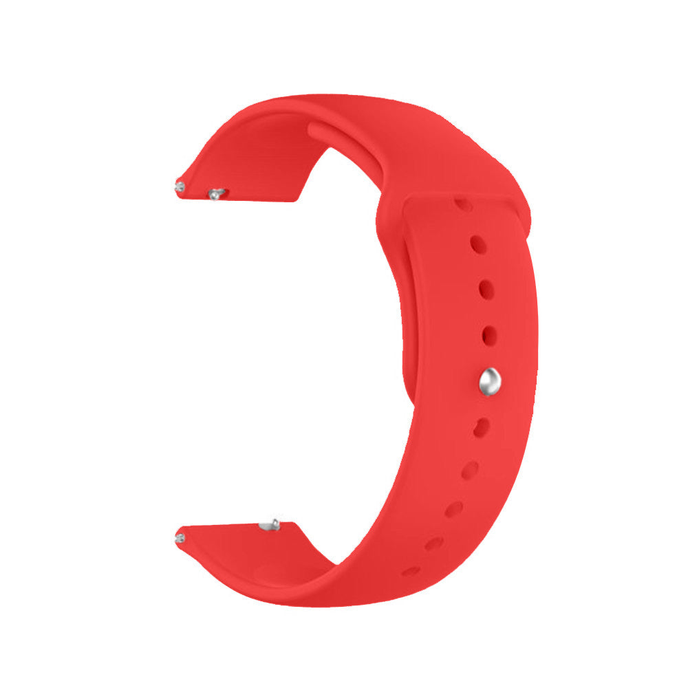 Ein leuchtend rotes Uhrenarmband wird gezeigt. Es hat ein gebogenes Design mit Löchern und einem Metallstift zur Anpassung und Befestigung.
