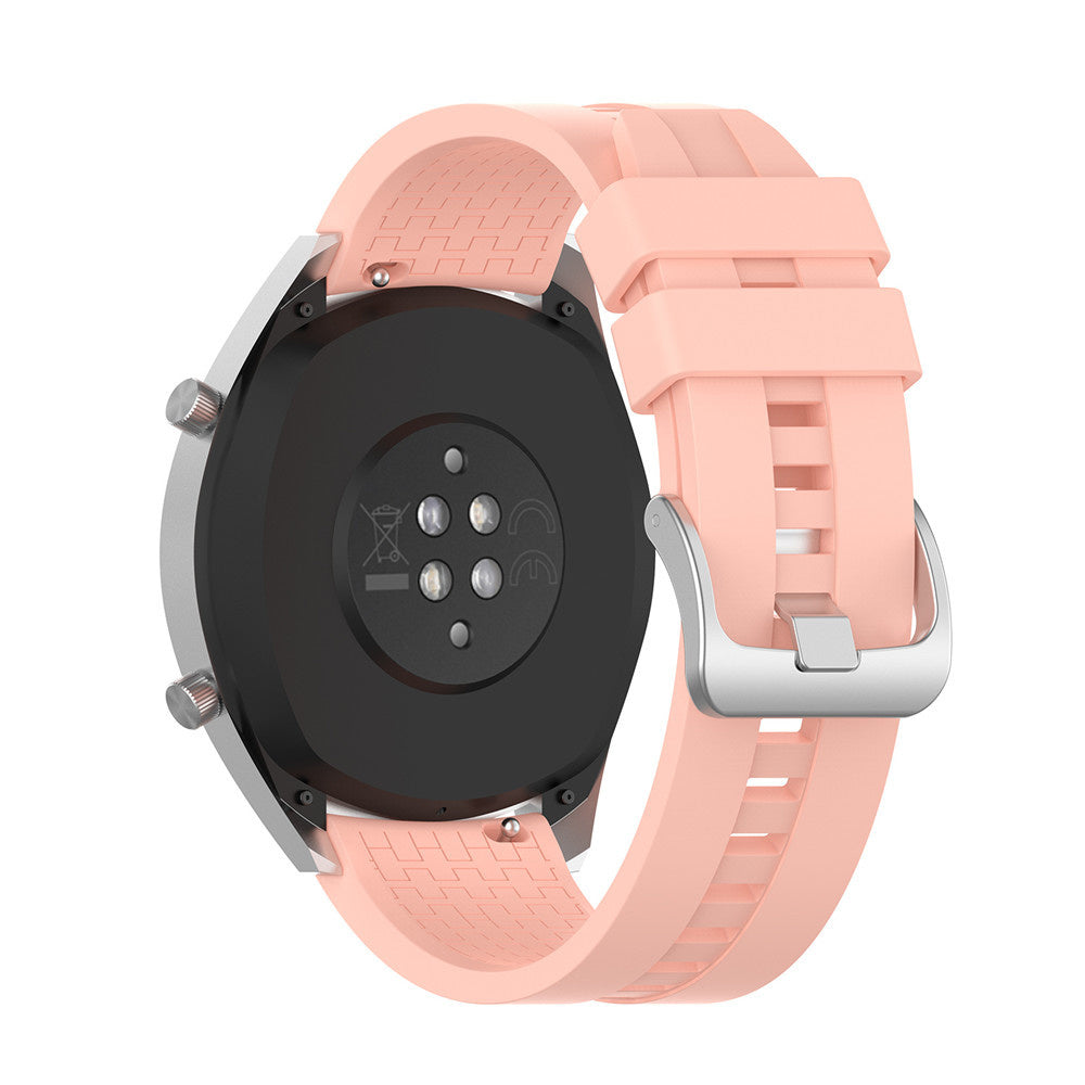 Eine pinkfarbene Smartwatch mit schwarzer Rückseite wird gezeigt. Das Uhrenarmband ist pink. Das Zifferblatt ist schwarz.