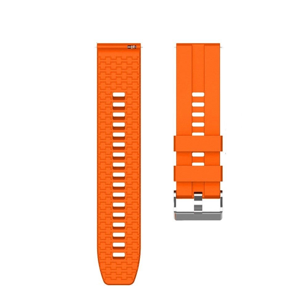 Zwei abgelöste orangefarbene Uhrenarmbänder auf weißem Hintergrund. Eines hat Löcher, das andere eine Schnalle.