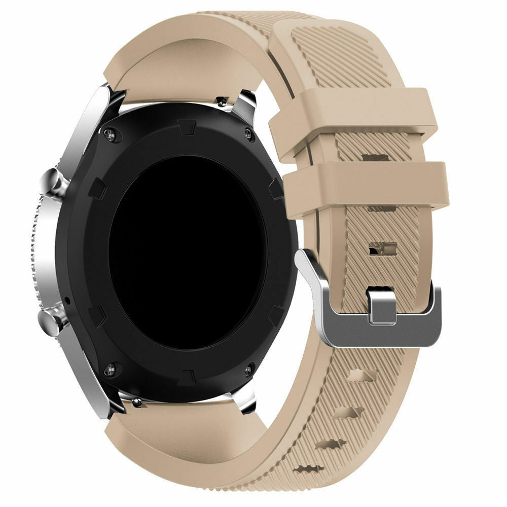 Eine Smartwatch mit schwarzem Zifferblatt, silberner Lünette und beigem Armband. Das Armband hat eine Schnalle. Der Hintergrund ist weiß.