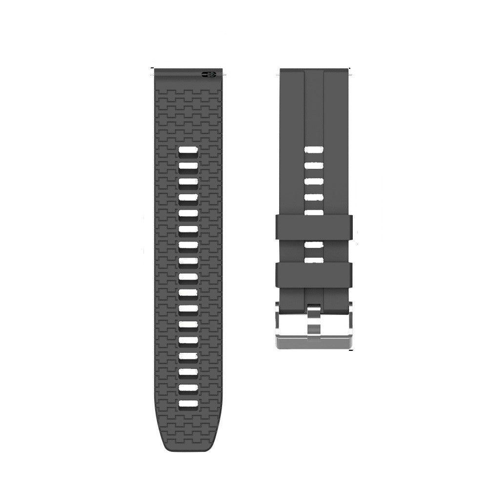 Zwei dunkelgraue Uhrenarmbänder mit strukturiertem Muster und Löchern. Ein Armband hat eine Schnalle.