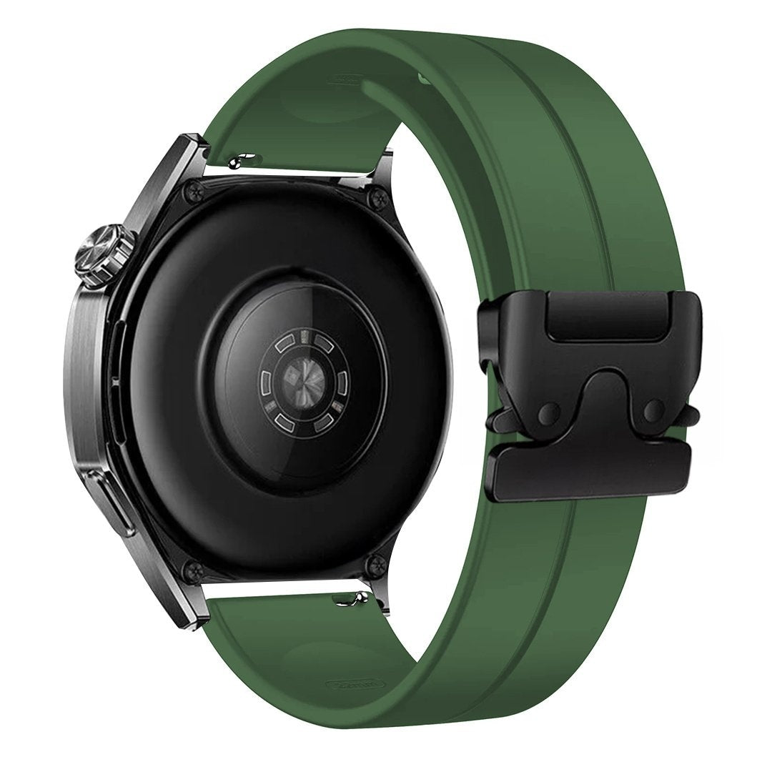 Schwarze Smartwatch mit grünem Armband. Die Uhr hat eine schwarze Rückseite mit Sensoren. Das Armband hat eine schwarze Schnalle.