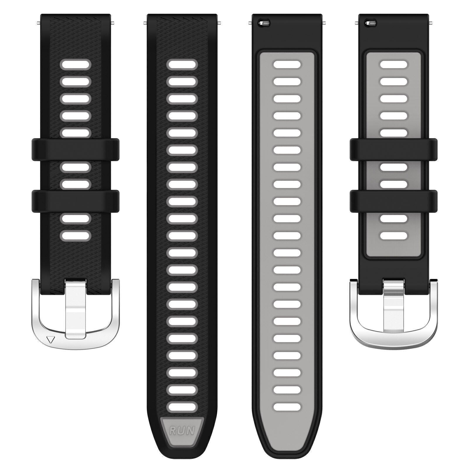 Vier Uhrenarmbänder. Zwei schwarz, zwei grau. Alle haben Löcher und Schnallen.