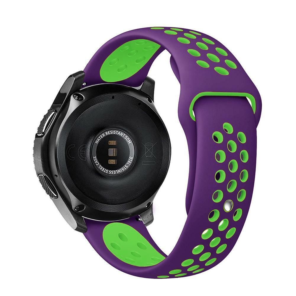 Eine Smartwatch mit lila Armband und grünen Akzenten. Das Zifferblatt ist schwarz mit silbernen Details. Das Armband hat perforierte Löcher.