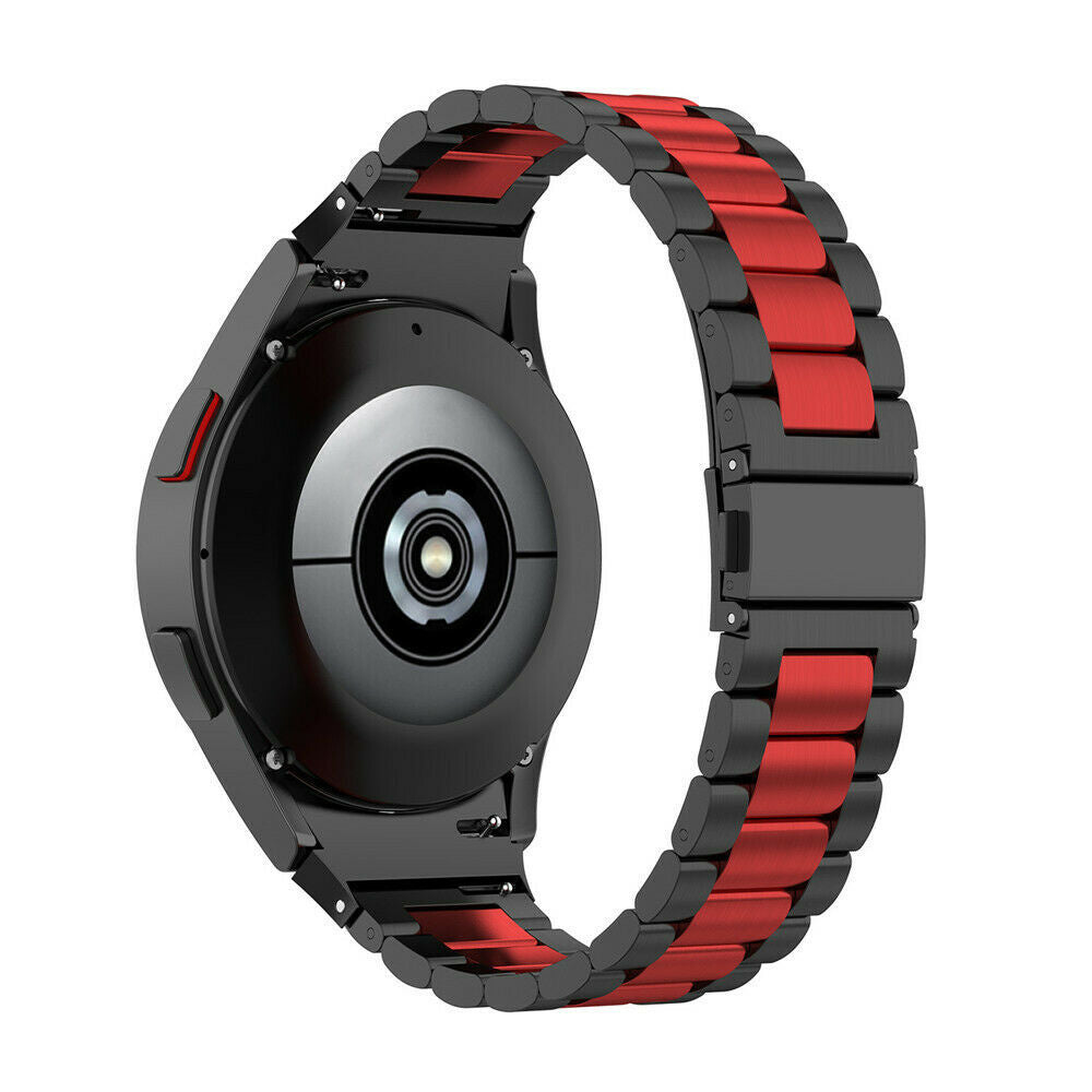 Schwarze Smartwatch mit rot-schwarzem Metallband. Die Rückseite der Uhr ist sichtbar und zeigt Sensoren.