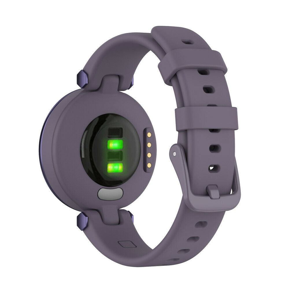 Eine lila Smartwatch mit Armband. Die Rückseite der Uhr hat Sensoren und Lichter. Das Band wird mit einer Schnalle befestigt.