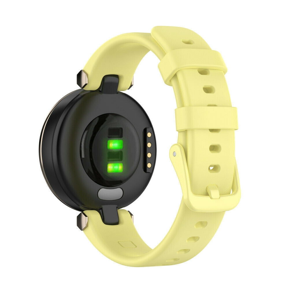 Eine gelbe Smartwatch mit einem schwarzen Sensor auf der Rückseite. Die Uhr befindet sich auf weißem Hintergrund. Der Sensor hat grüne Lichter.