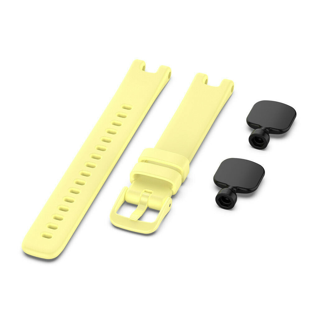 Gelbe Uhrenarmbandteile und zwei schwarze Verbinder auf weißem Hintergrund. Das Armband ist dreiteilig.