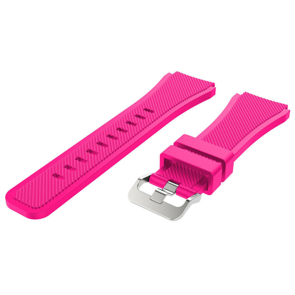 Ein pinkfarbenes Uhrenarmband liegt auf einer weißen Oberfläche. Es hat eine Edelstahlschnalle und eine strukturierte Oberfläche.