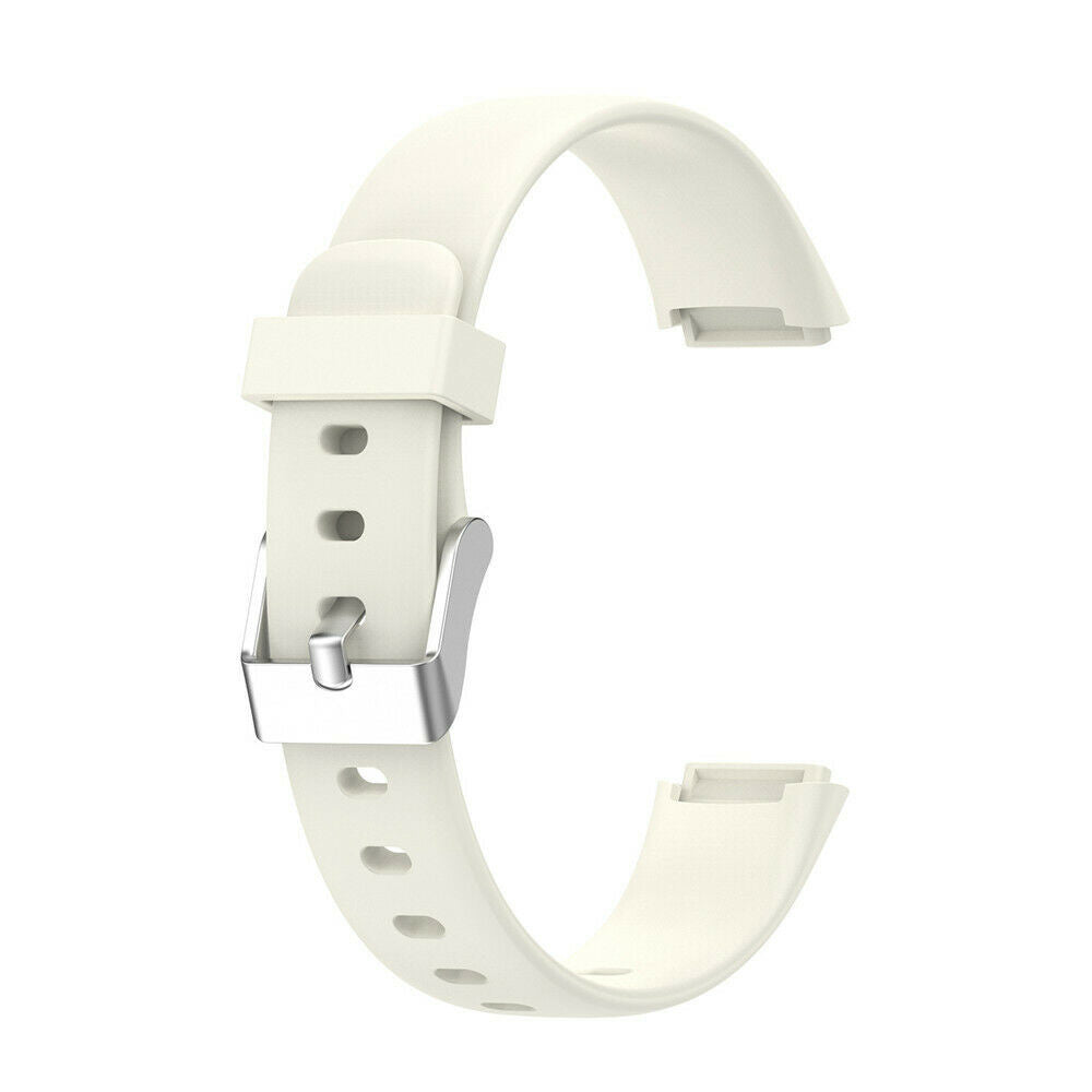 Cremefarbenes Uhrenarmband mit silberner Schnalle. Das Armband hat mehrere Löcher und ist an beiden Enden abgetrennt.