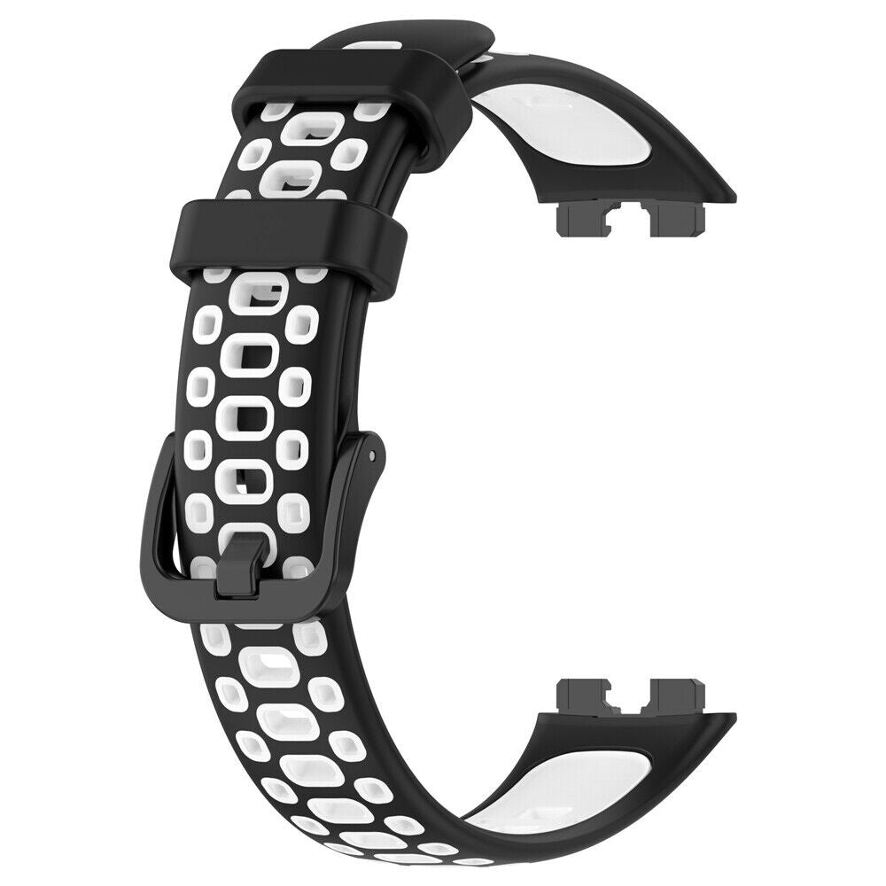 Schwarz-weißes Uhrenarmband. Schwarze Schnalle und Armband mit weißen ovalen Aussparungen. Weißes Band im schwarzen Armband.