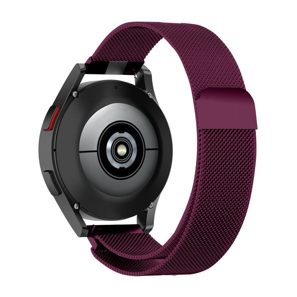 Eine schwarze Smartwatch mit einem dunkelvioletten Mesh-Armband wird angezeigt. Die Uhr ist abgewinkelt und zeigt die Rückseite mit einem silbernen Sensor.
