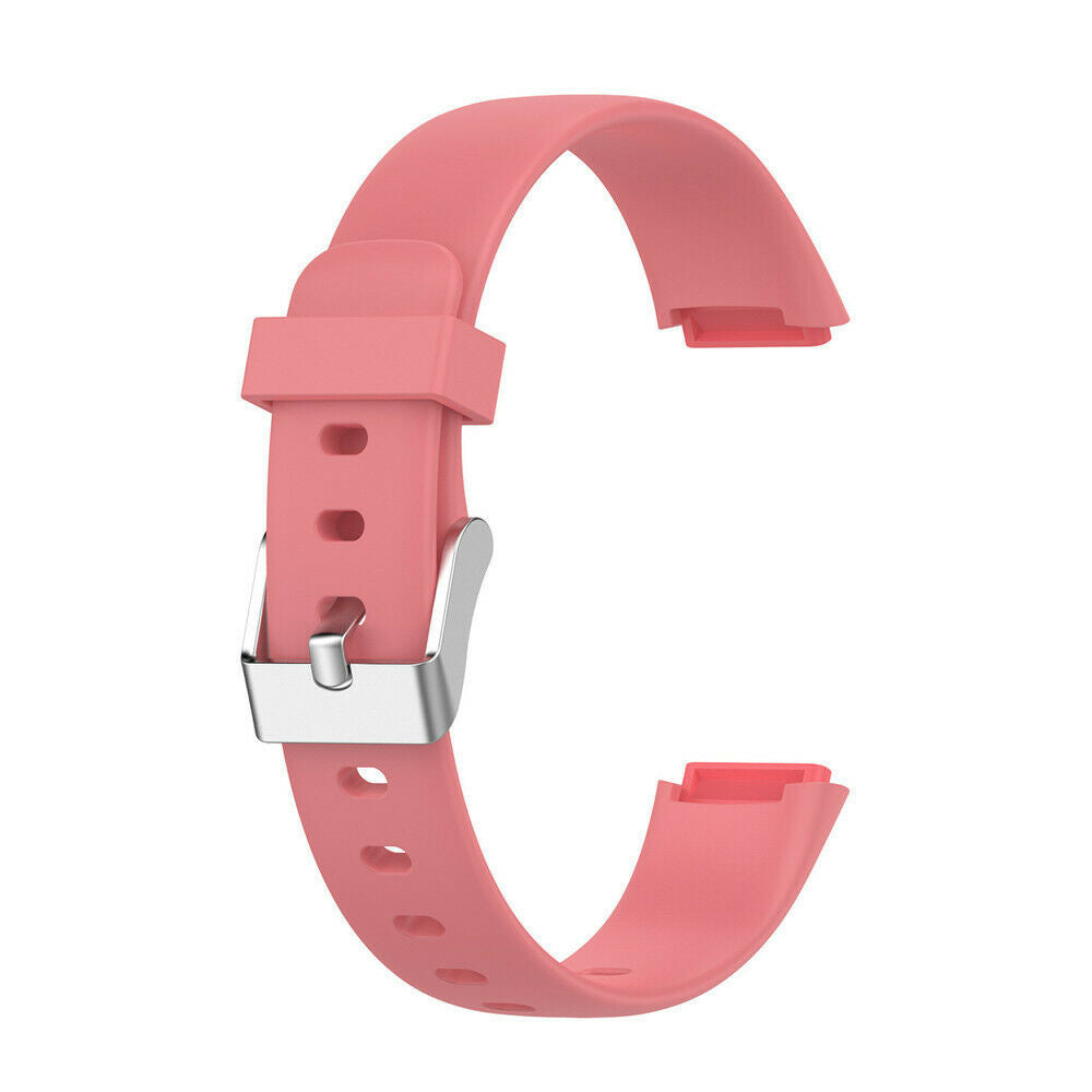 Ein rosa Uhrenarmband mit einer silbernen Schnalle. Das Band ist gebogen und hat Löcher zur Anpassung. Vor weißem Hintergrund.