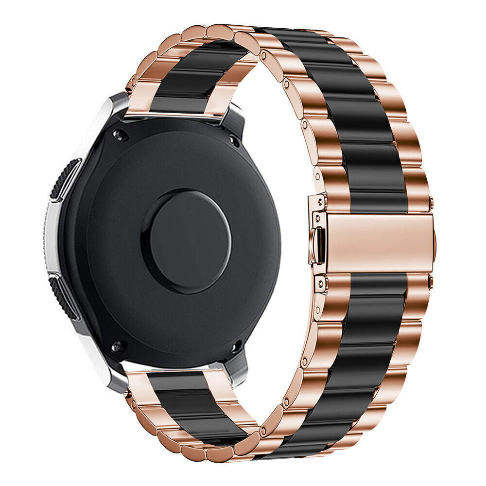 Eine schwarze Smartwatch mit einem roségoldenen und schwarzen Armband. Das Zifferblatt ist schwarz und kreisförmig.