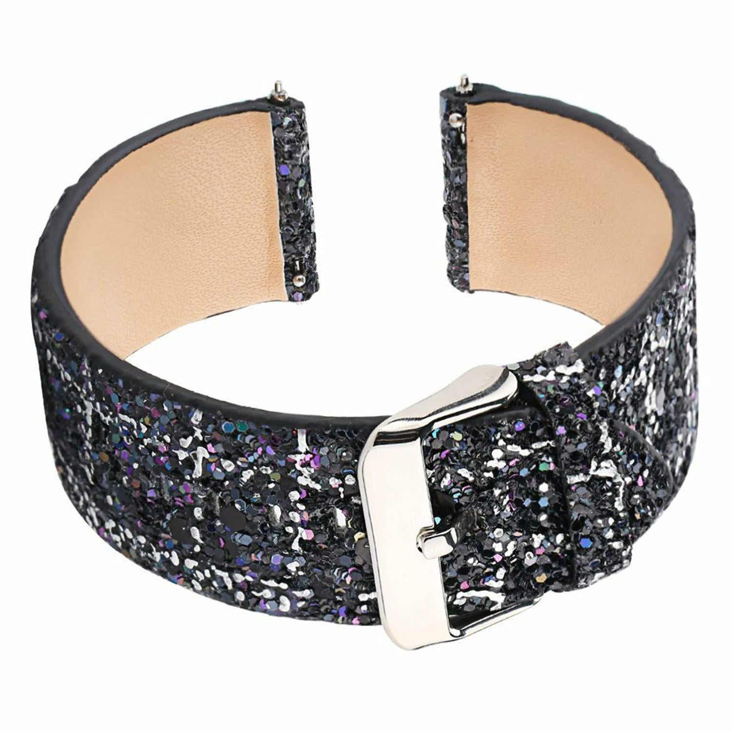 Ein breites, schwarzes Armband mit Glitzer und einer silbernen Schnalle. Die Innenseite ist beige. Das Armband ist auf einer Seite offen.
