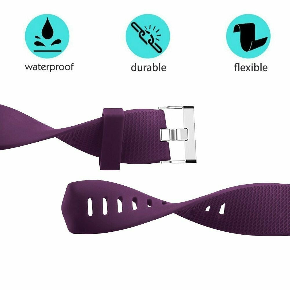 Lila Uhrenarmband mit Symbolen für wasserdicht, haltbar und flexibel. Das Band hat eine Metallschnalle und eine strukturierte Oberfläche.