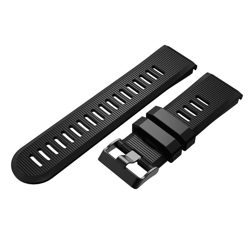 Schwarze Uhrenarmbandkomponenten, darunter ein langes Armband mit Löchern und ein kürzeres mit Schnalle, auf weißer Oberfläche.