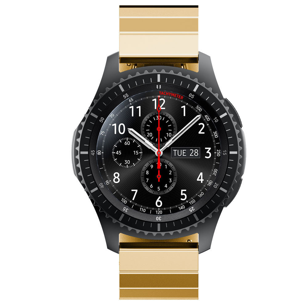 Eine schwarze Smartwatch mit goldenen Akzenten. Sie zeigt die Uhrzeit mit Zeigern, Zahlen und kleinen Zifferblättern an. Das Datum ist Dienstag, der 28.