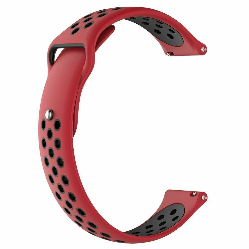 Ein rotes Armband mit schwarzen Perforationen. Das Armband ist C-förmig gebogen. Schwarze Innenseite mit silbernen Stiften.