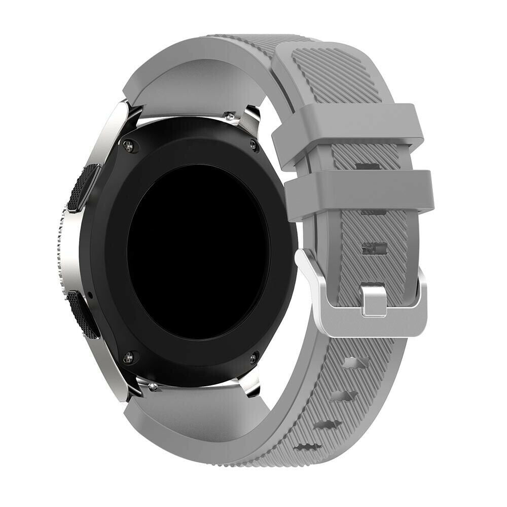 Eine silberne Smartwatch mit schwarzem Bildschirm und grauem Armband wird angezeigt. Das Armband ist mit einer Schnalle an der Uhr befestigt.
