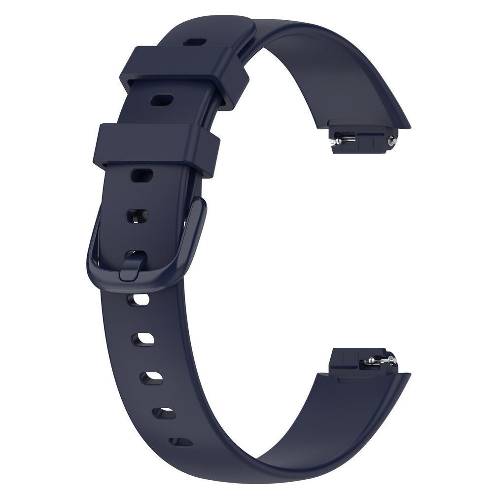 Ein marineblaues Uhrenarmband ist gebogen, mit einer Schnalle an einem Ende und einem Stift am anderen. Der Hintergrund ist weiß.