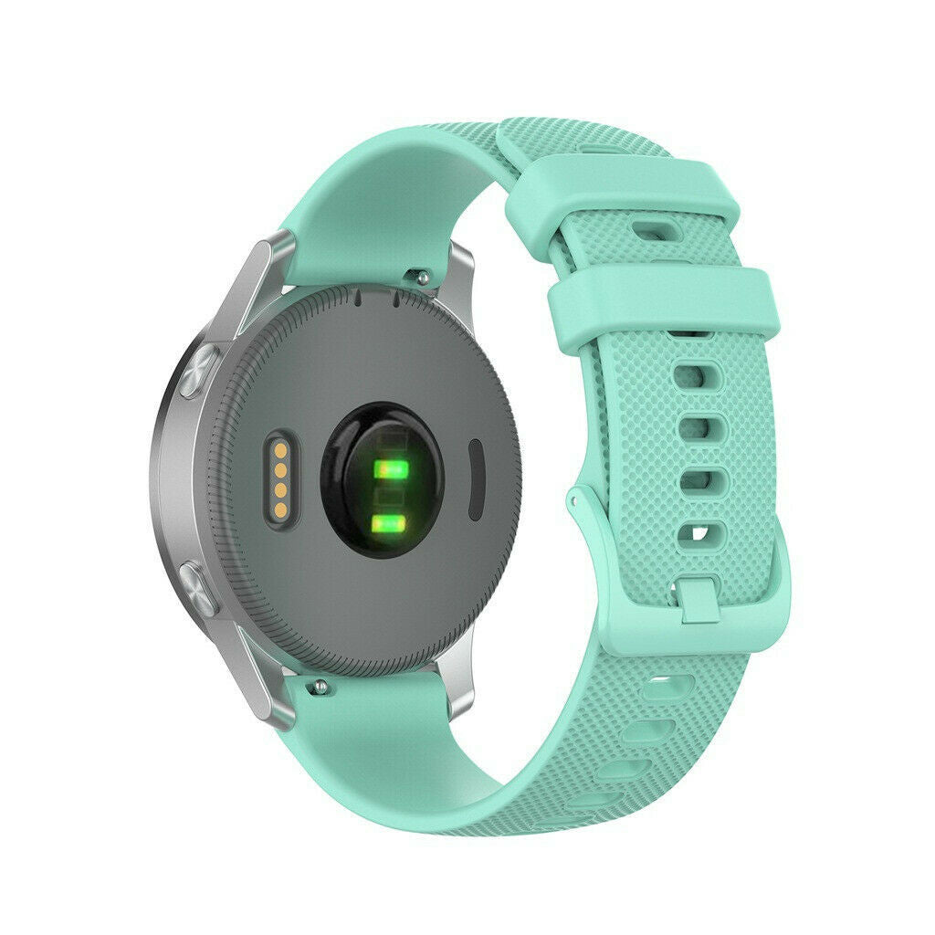 Eine türkisfarbene Smartwatch auf weißem Hintergrund. Die Uhr hat ein graues Gehäuse und ein türkisfarbenes Armband. Die Rückseite hat einen Herzfrequenzsensor.