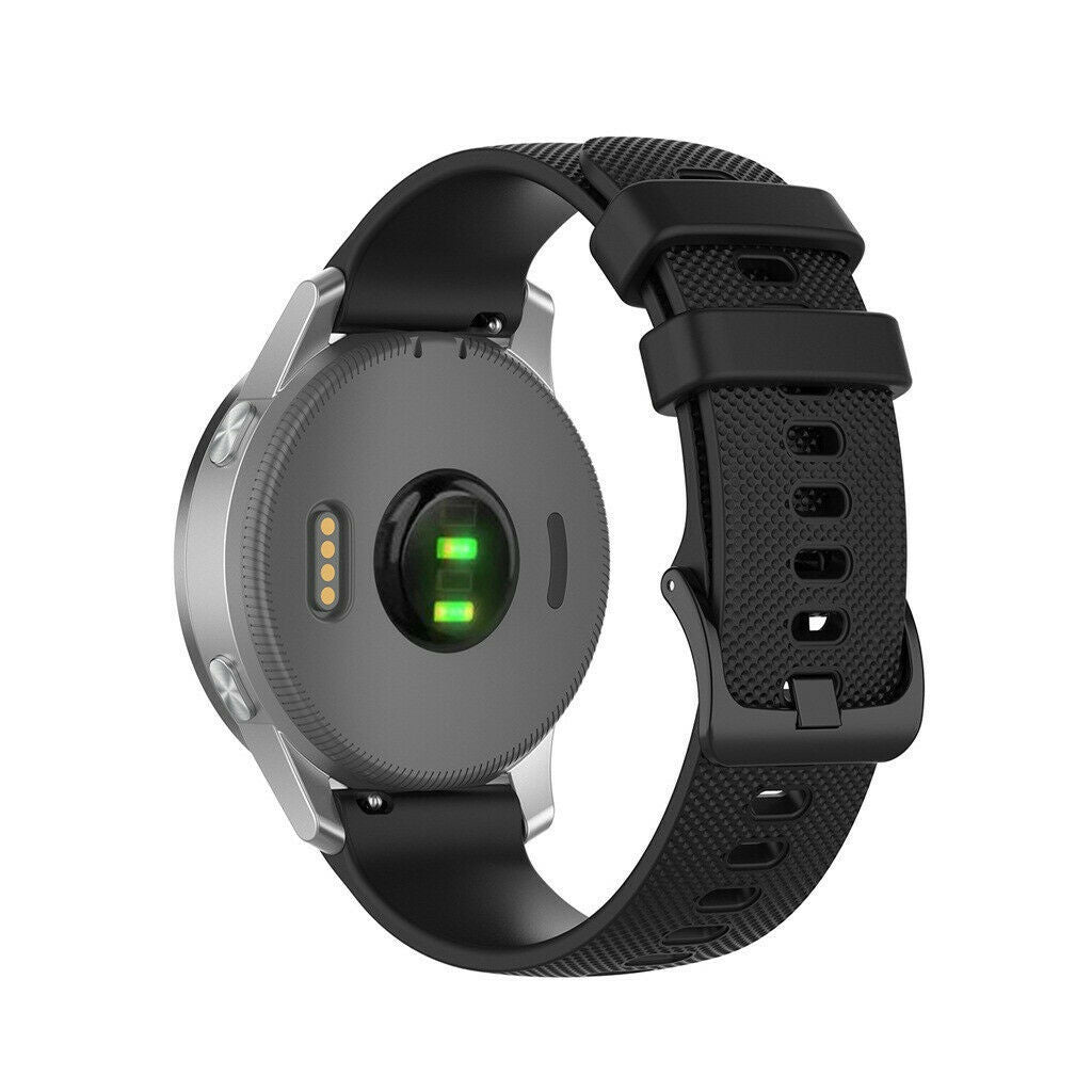 Eine schwarze Smartwatch mit silberner Lünette, schwarzem Armband und grauer Rückseite mit Sensoren. Das Band ist strukturiert.