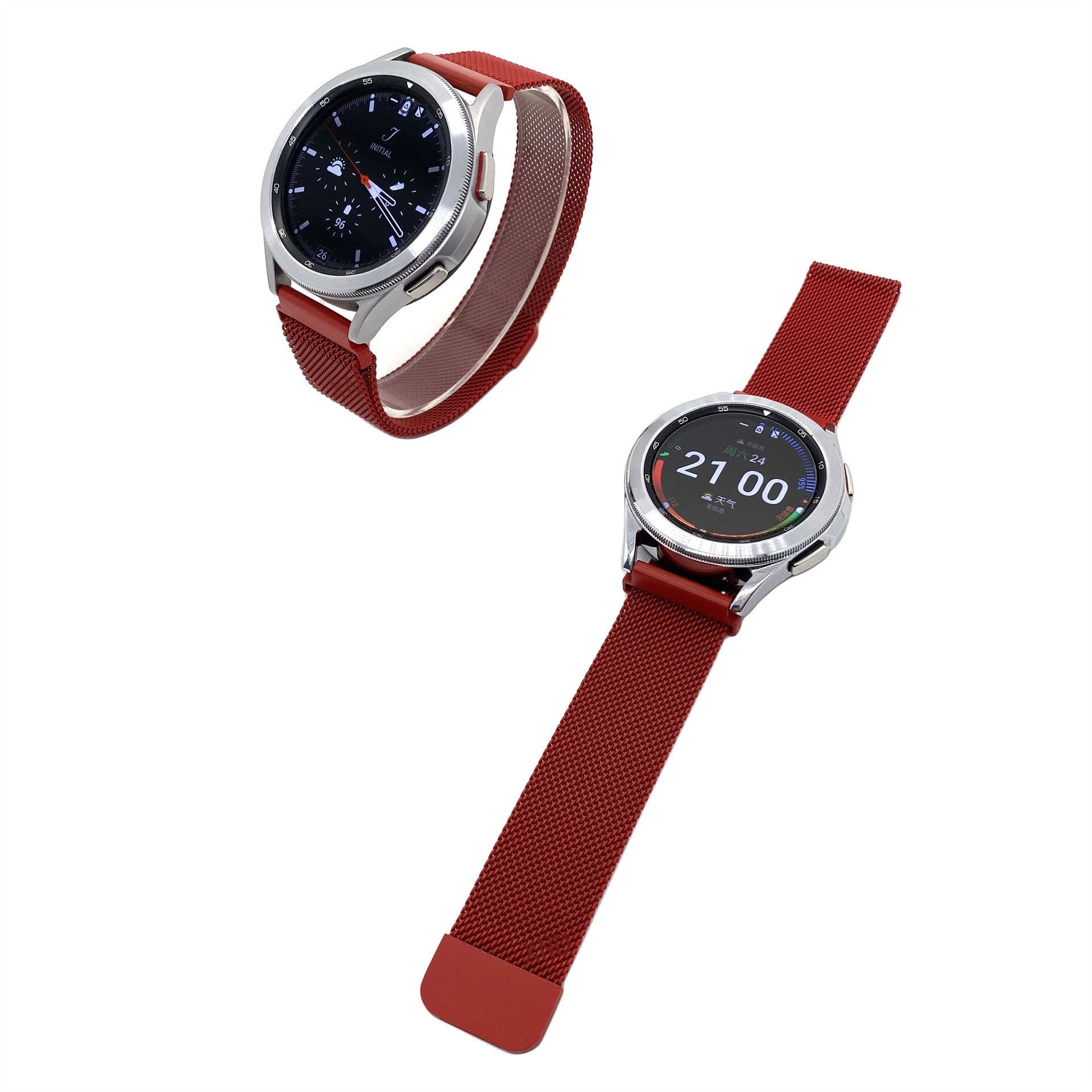 Zwei Smartwatches mit roten Armbändern werden vor weißem Hintergrund gezeigt. Eine Uhr ist aufrecht, die andere flach.