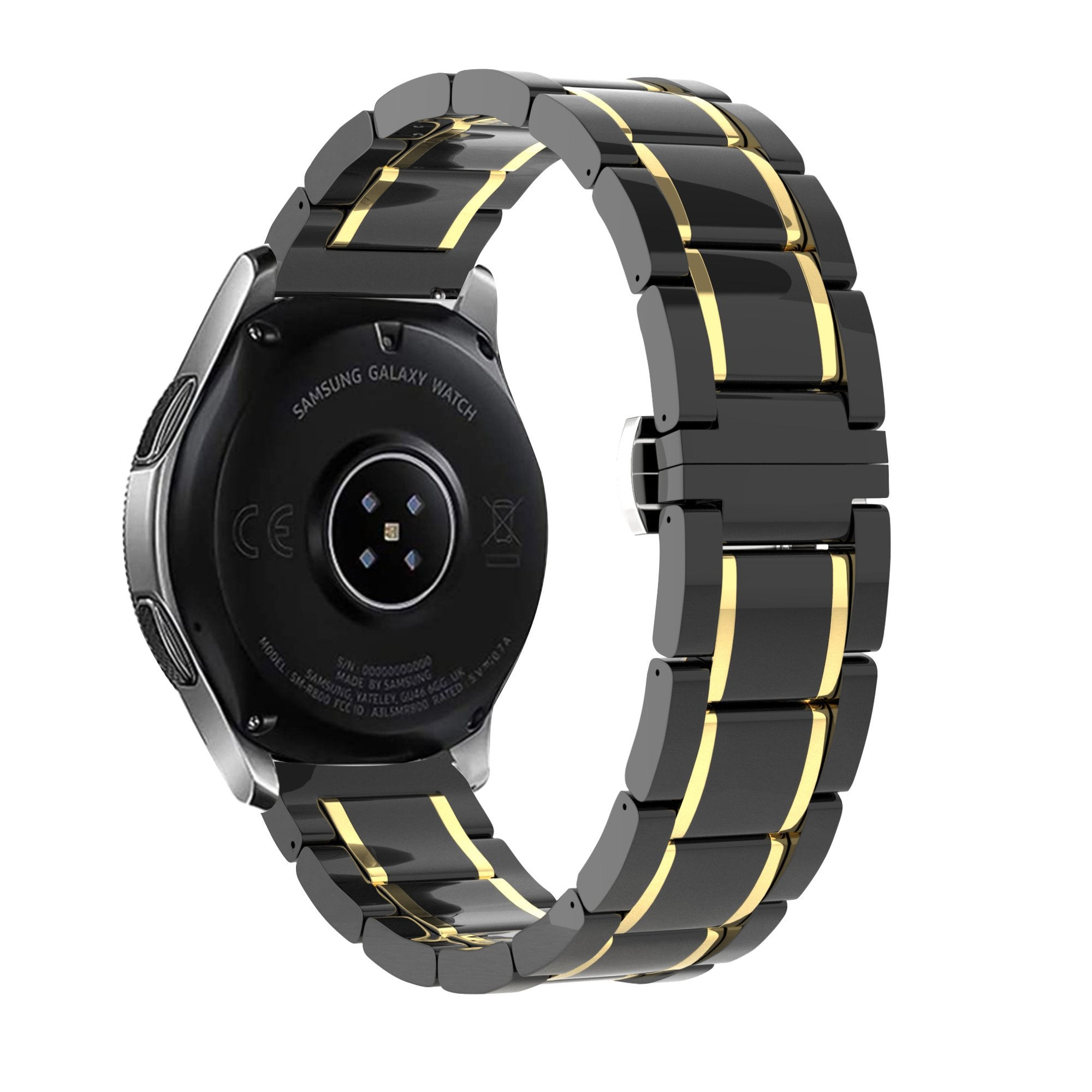 Samsung Galaxy Watch. Schwarze Uhr mit goldenen Akzenten. Die Rückseite der Uhr mit Text und Sensoren ist sichtbar.