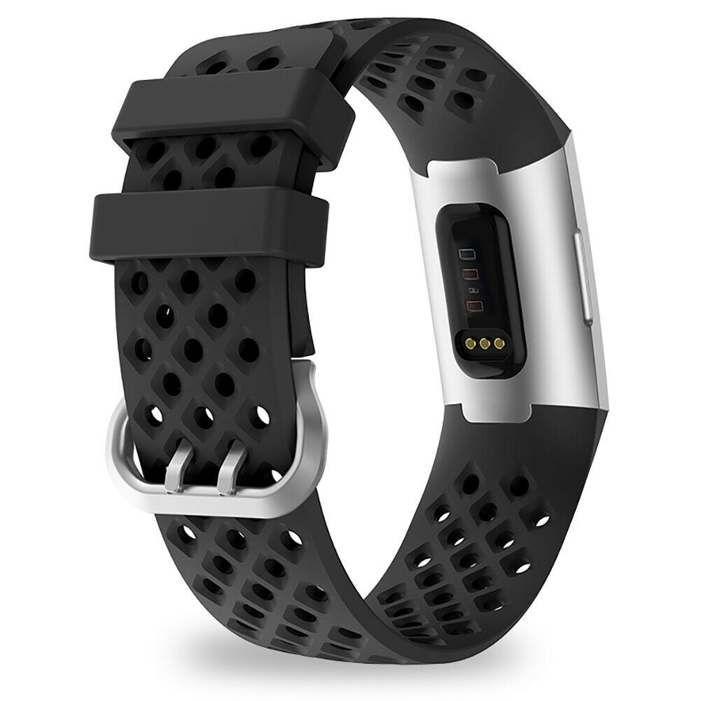 Schwarzer Fitness-Tracker mit silbernem Gehäuse. Das Band hat Perforationen. Die Uhr zeigt einen Bildschirm mit Indikatoren und drei Punkten.