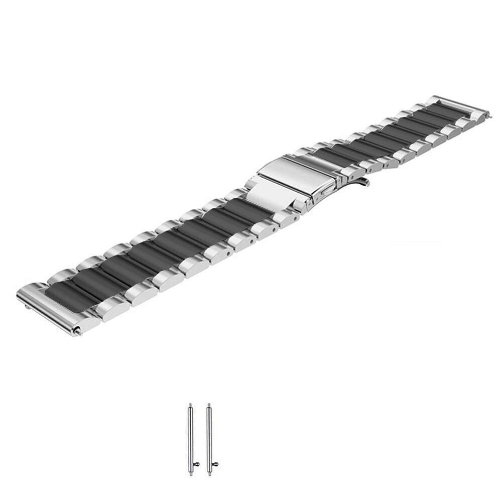 Ein metallisches Uhrenarmband mit schwarzen Gliedern und einem silbernen Verschluss wird vor weißem Hintergrund gezeigt. Zwei Stifte sind ebenfalls abgebildet.