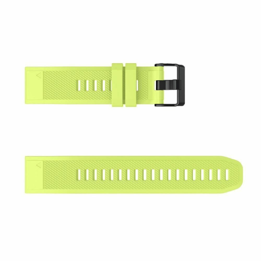 Ein hellgrünes Uhrenarmband liegt auf weißem Grund. Der obere Teil hat Löcher und eine Schnalle, der untere Teil hat mehrere Löcher.