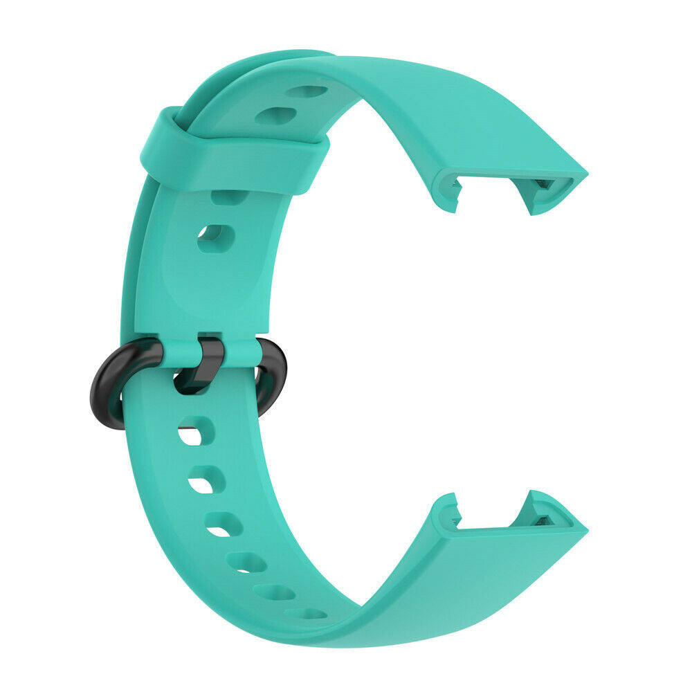 Ein türkisfarbenes Uhrenarmband, das in C-Form gebogen ist. Es hat Löcher und einen schwarzen Verbinder. Der Hintergrund ist weiß.
