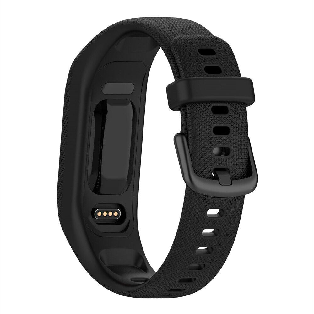 Eine schwarze Fitness-Tracker-Uhr. Sie verfügt über ein Armband mit Löchern, eine Schnalle und einen Anzeigebereich mit Kontrollleuchten.