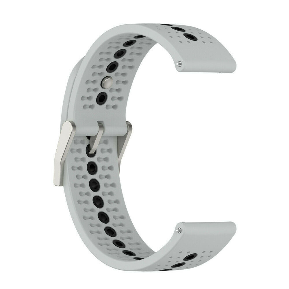 Ein hellgraues Uhrenarmband mit schwarzen Punkten und einer silbernen Schließe. Das Band hat eine C-Form.