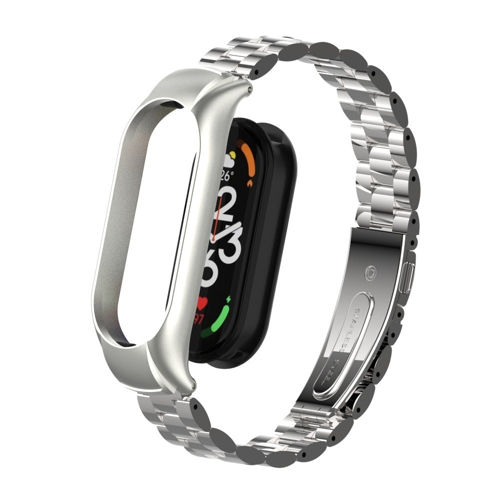 Ein silbernes Metallarmband mit einem schwarzen Smartwatch-Zifferblatt, das Zeit und Temperatur anzeigt. Das Armband ist an einem silbernen Rahmen befestigt.