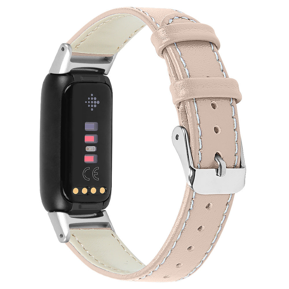Eine Smartwatch mit hellrosa Lederband. Das Zifferblatt ist schwarz mit farbigen Anzeigen. Silberne Schnalle.