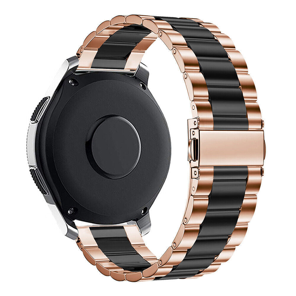 Eine Smartwatch mit schwarzem Zifferblatt und einem zweifarbigen Armband in Roségold und Schwarz. Das Armband ist aus Metall und hat einen Verschluss.