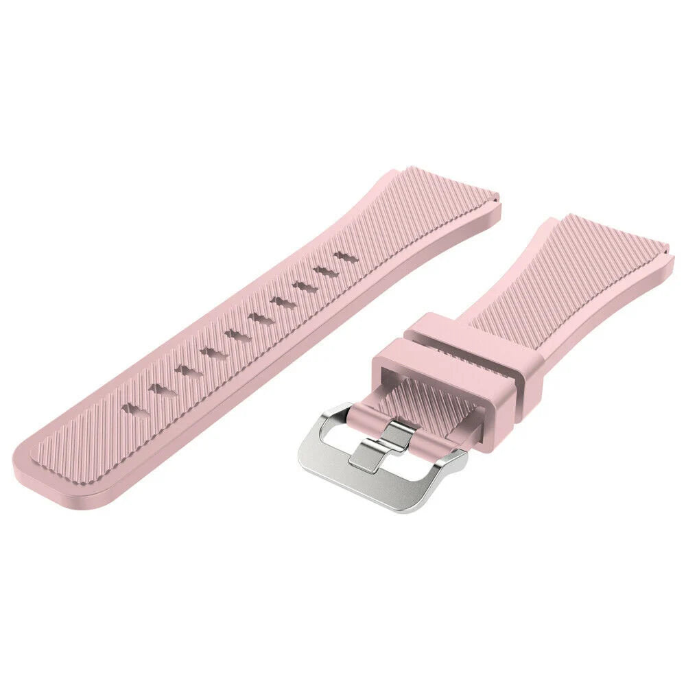 Rosa Uhrenarmbandteile. Ein langer Riemen und ein kürzerer Riemen mit silberner Schnalle.